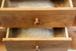 Two open drawers of Shaker Huntboard showing details of wooden drawer front and mushroom style cherry knobs