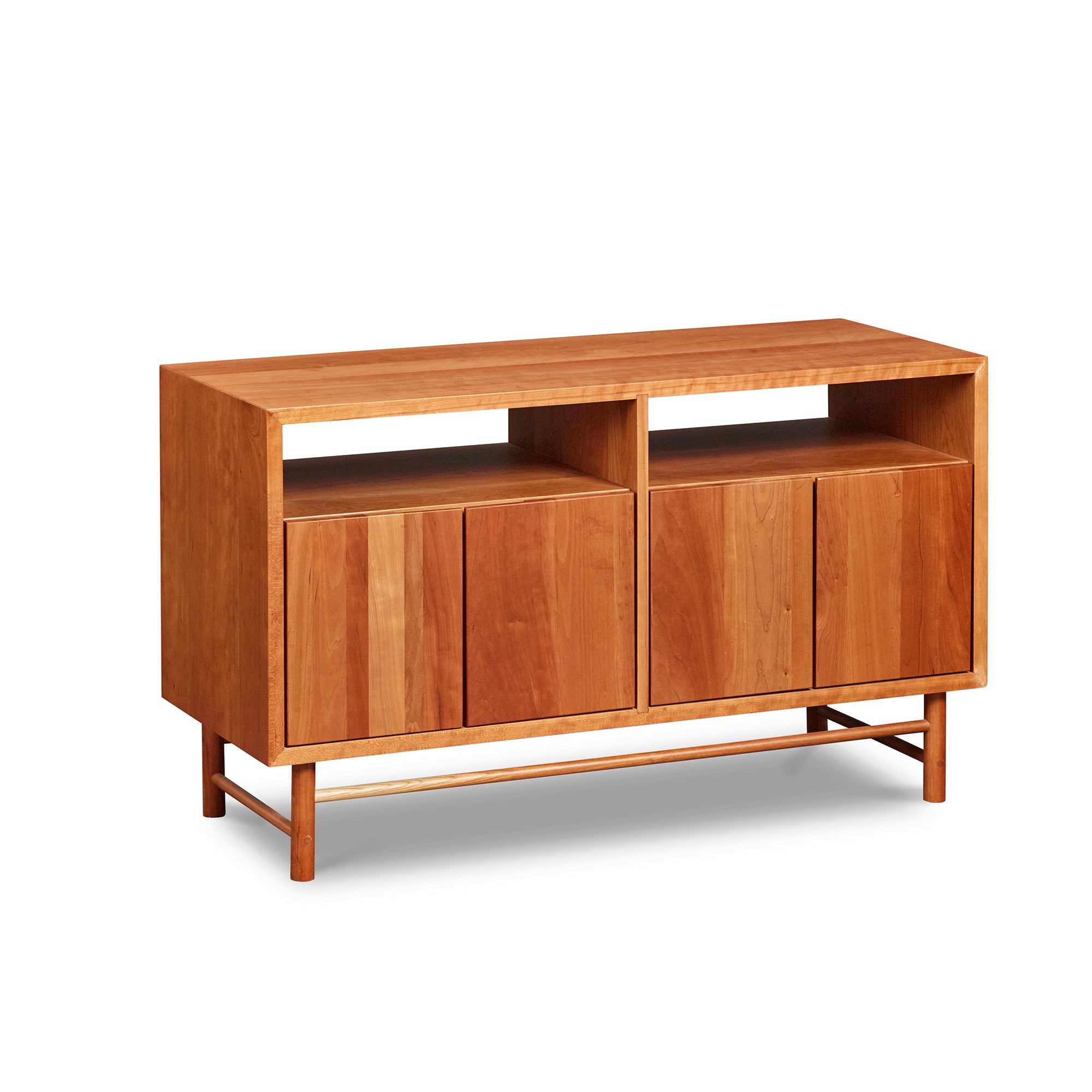 Mid-century modern Navarend media case in solid cherry wood with round legs and stretchers and four doors with storage space