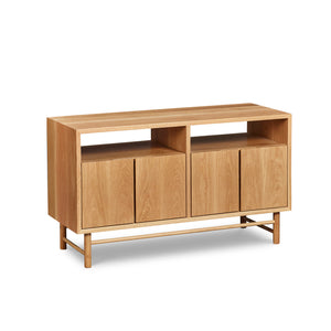 Mid-century modern Navarend media case in solid white oak wood with round legs and stretchers and four doors with storage space