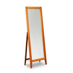 Tall floor length self standing mirror with cherry wood frame and square tapered legs