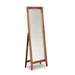 Tall floor length self standing mirror with walnut wood frame and square tapered legs