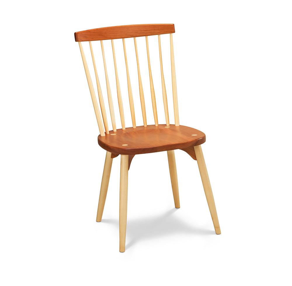 Classic spindle back chair with round tapered legs in cherry and maple