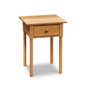 Modern interpretation of a classic Shaker style nightstand with one drawer and rounded legs, in solid white oak wood