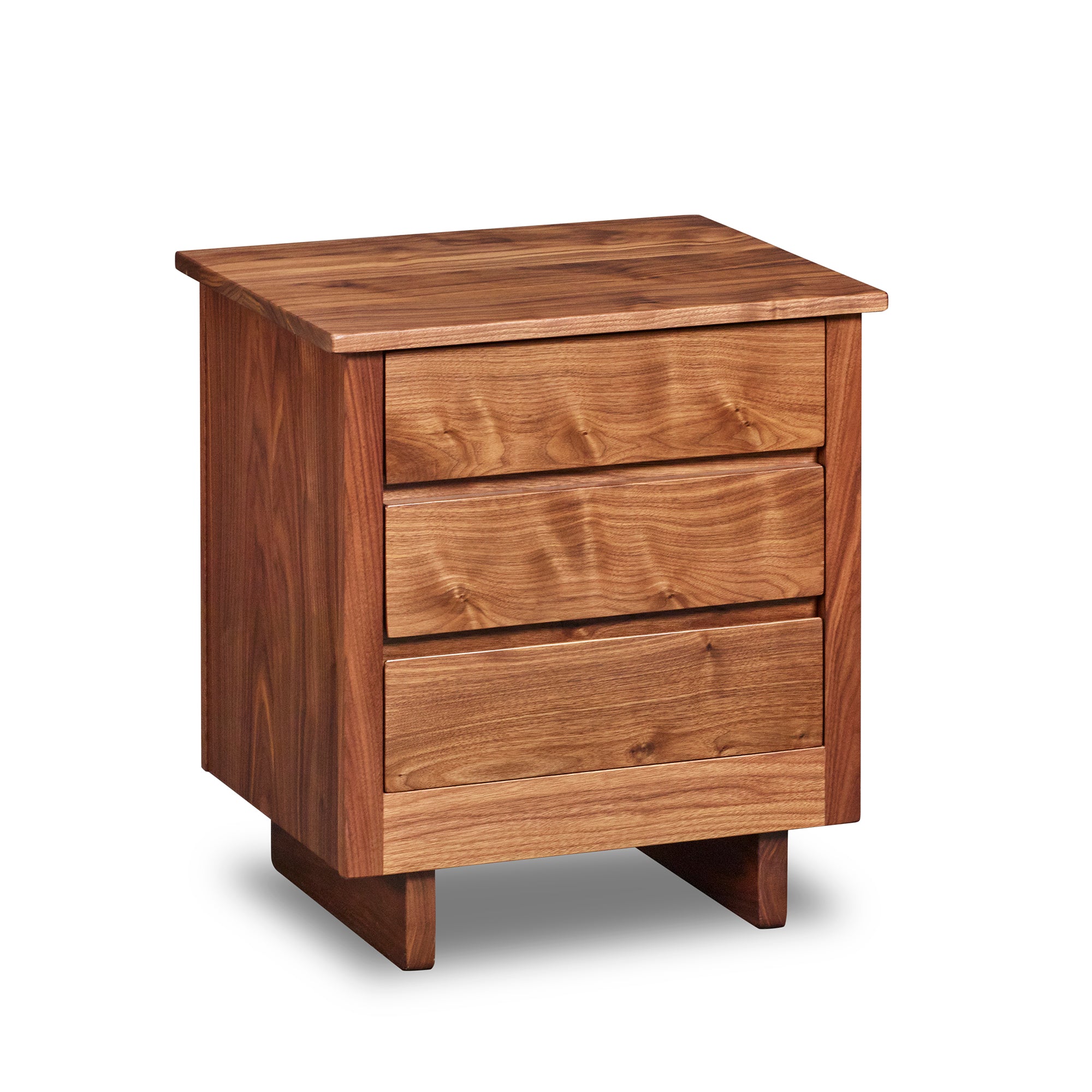 Chilton Furniture's Acadia collection three drawer walnut wood bedroom nightstand with under drawer pulls and panel base