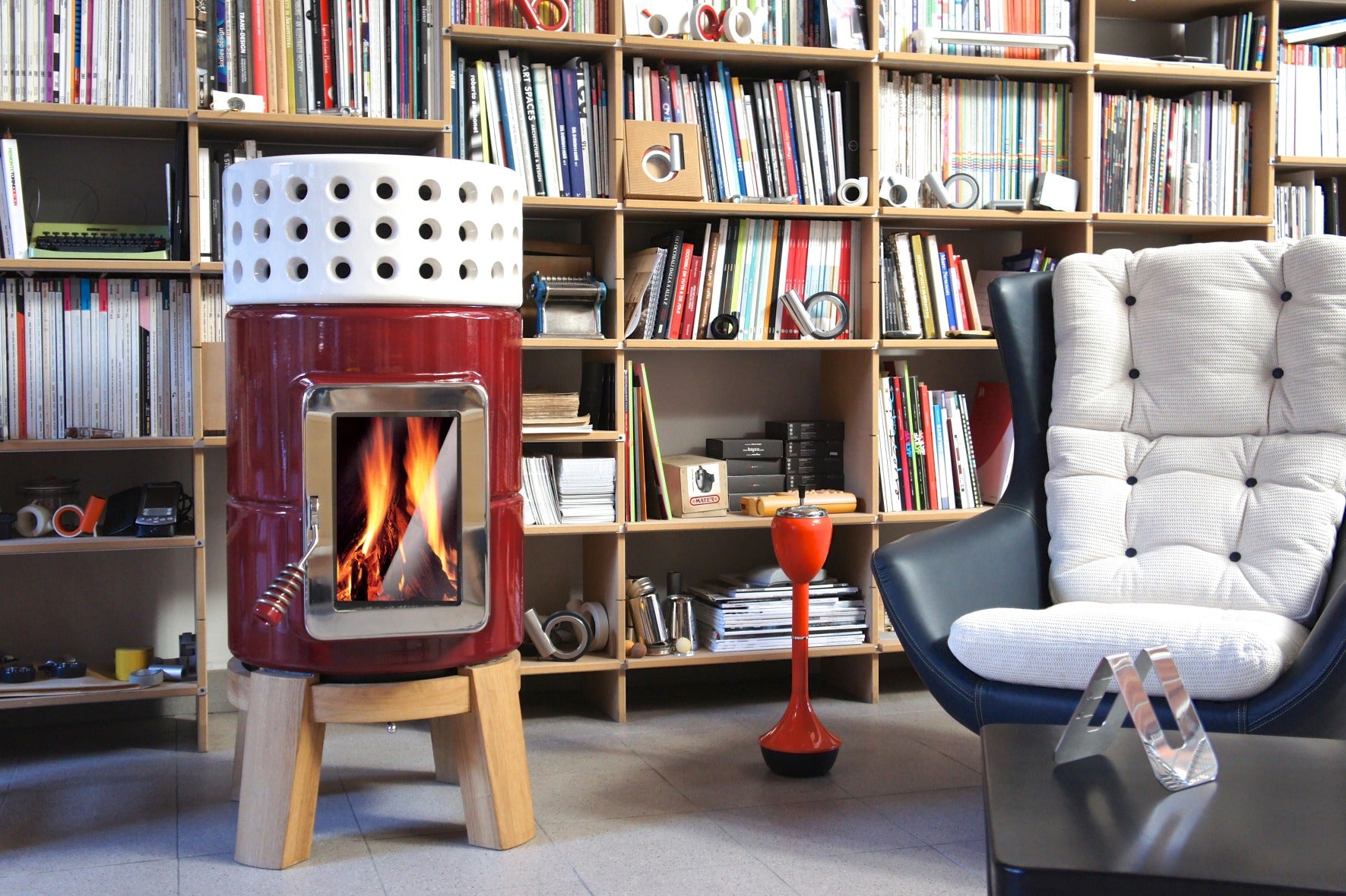 Modern Scandinavian Style wood-burning stove, in red with oak wood base