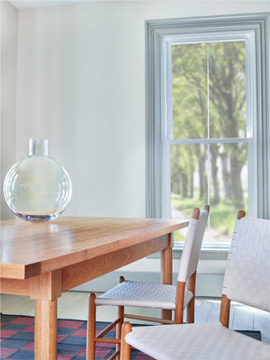 Modern dining room with white oak Revelry table and white Tappan side chairs, from Maine's Chilton Furniture Co. 