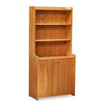 Tiered bookcase with rounded corners and doors over base, built in cherry. 