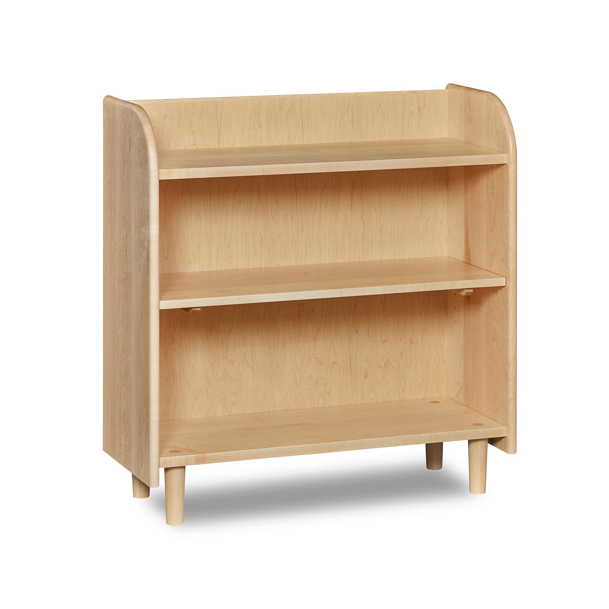 Bookshelf with open top, rounded corners, and round tapered legs, in maple wood.