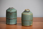 Small copper green ceramic vases