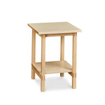 Modern trestle-style side table with visible joinery and low shelf in maple, from Maine's Chilton Furniture Co.