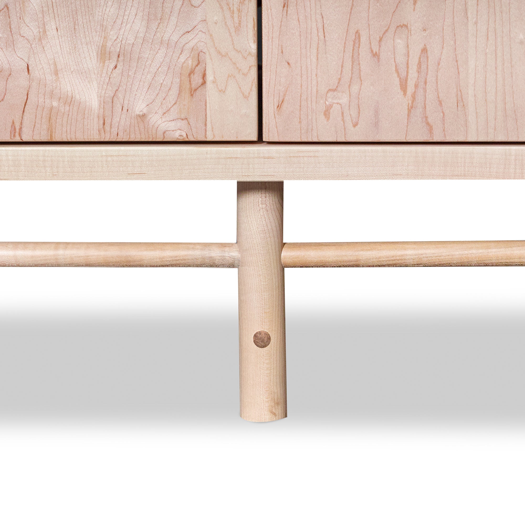 Detail of legs, stretchers and mortise and tenon joinery on solid maple wood Navarend Media Case