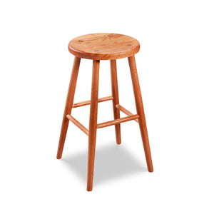 Simple round solid cherry wood stool, from Maine's Chilton Furniture Co.