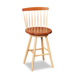 Cherry and maple swivel counter stool with spindle back, from Maine's Chilton Furniture Co.