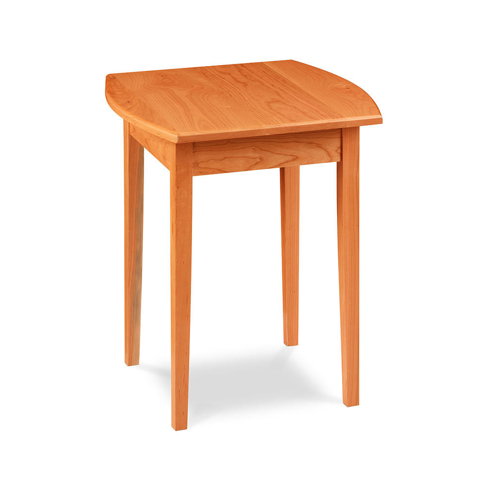 Shaker style cherry wood side table, with a curved "boat shaped" side edge