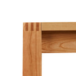 Visible joinery on Harbor Bench in cherry wood from Chilton Furniture