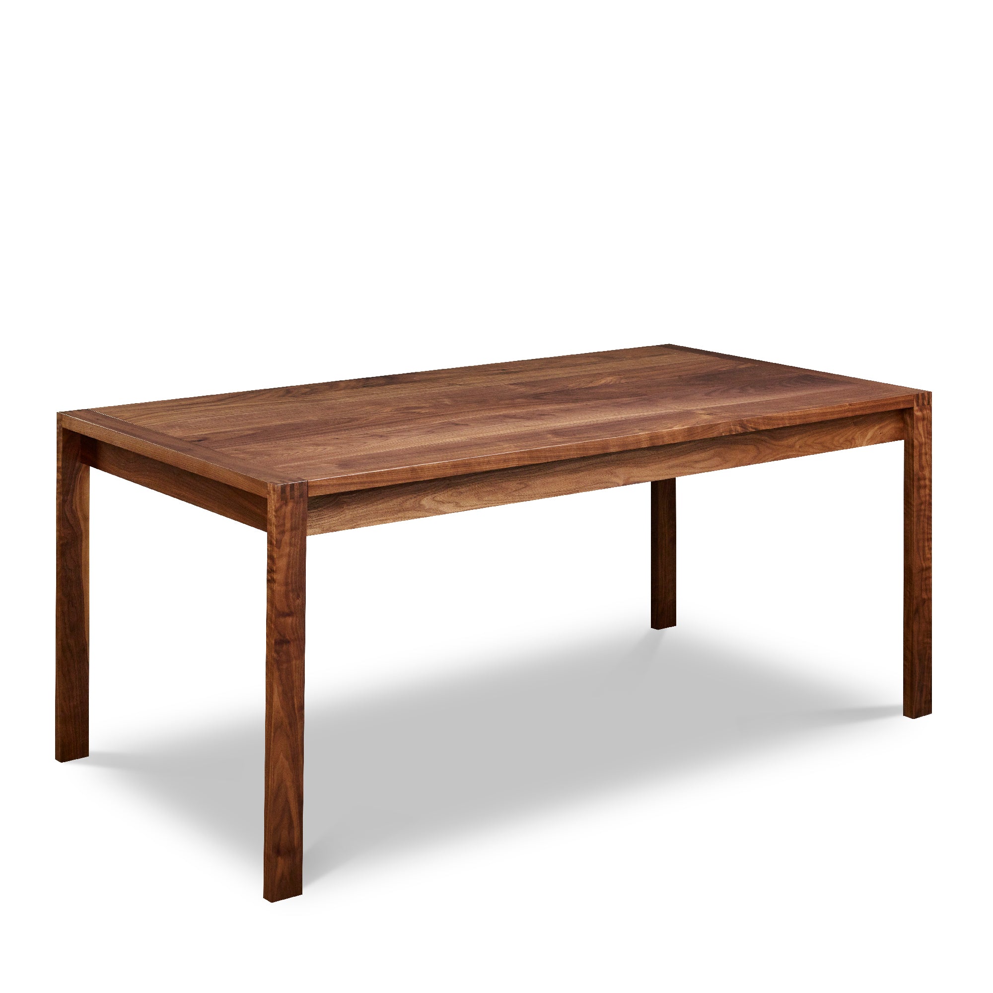 Modern parsons table with visible joinery in walnut, from Maine's Chilton Furniture Co.
