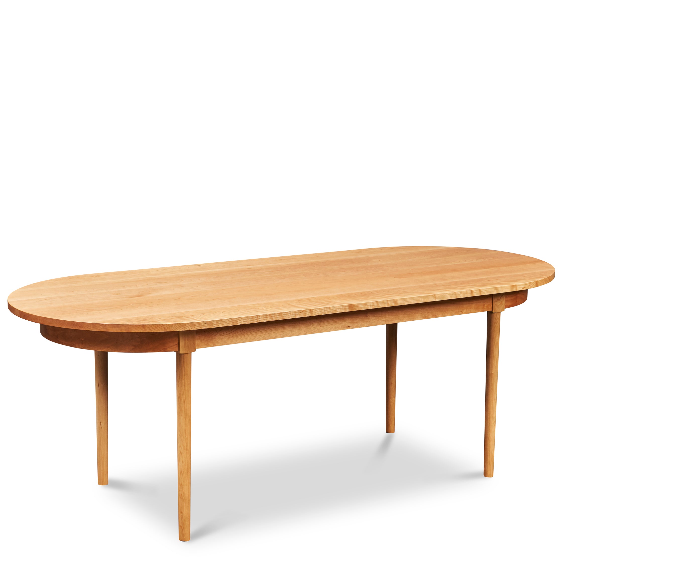 Modern solid cherry oval dining table from Chilton Furniture Co. in Maine