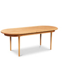 Modern solid cherry oval dining table from Chilton Furniture Co. in Maine