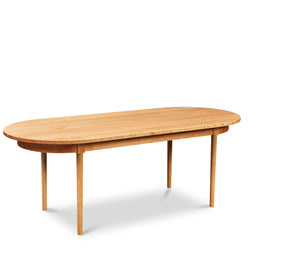 Modern solid cherry oval dining table from Chilton Furniture Co. in Maine