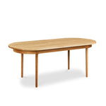 Modern solid white oak oval dining table from Chilton Furniture Co. in Maine