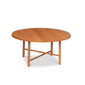 Round Scandinavian style coffee table with round legs in cherry