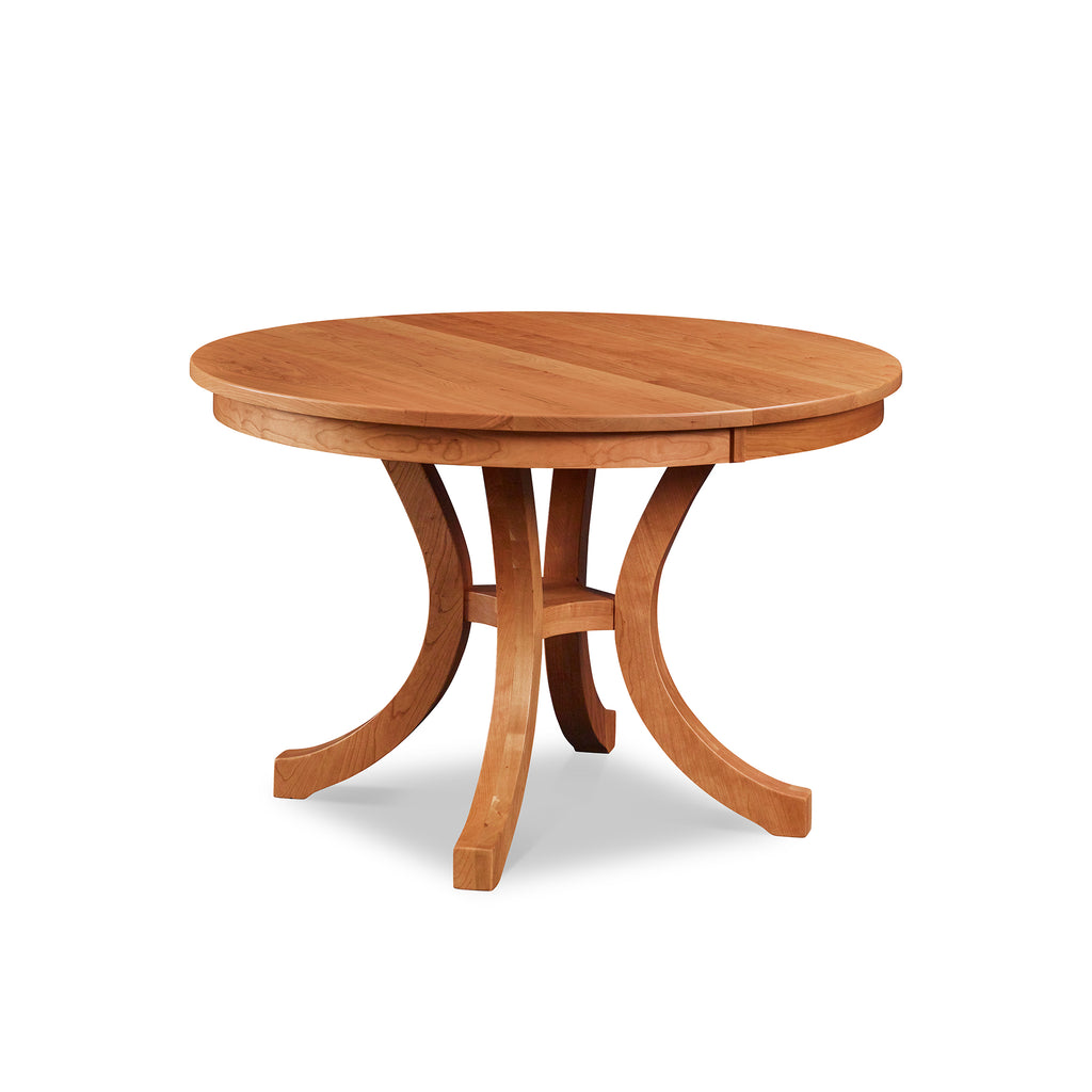 Cherry Prouts Neck pedestal dining table with flared legs, from Maine's Chilton Furniture Co. 