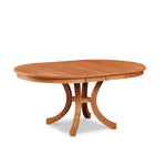 Cherry Prouts Neck extension dining table with flared legs and two leaves in, from Maine's Chilton Furniture Co. 