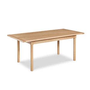 Modern Revelry dining table with straight turned legs and breadboard ends, built in solid white oak