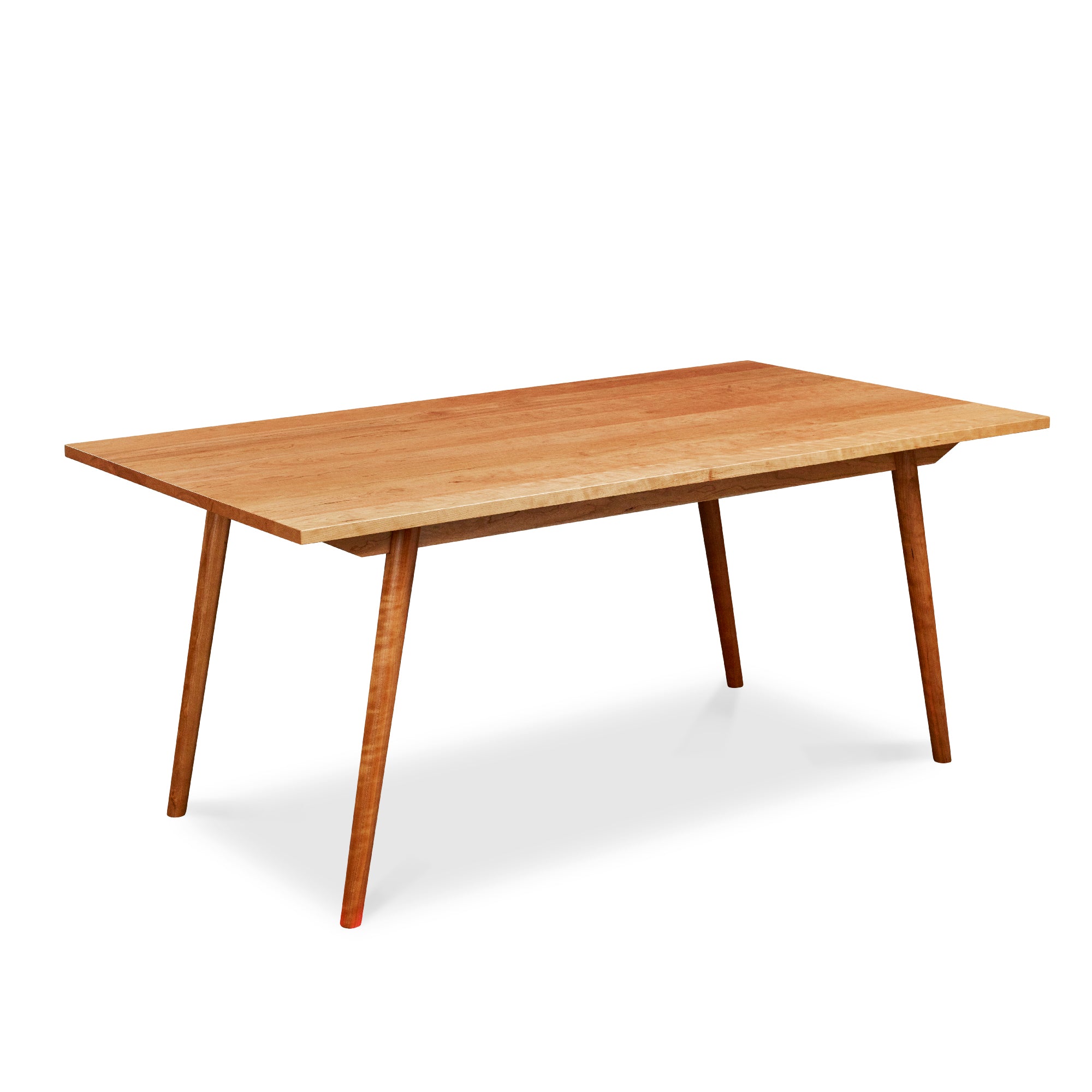 Mid-century Scandinavian rectangle dining table with angled legs in solid cherry wood