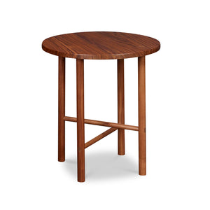 Round Scandinavian style end table with round legs in walnut