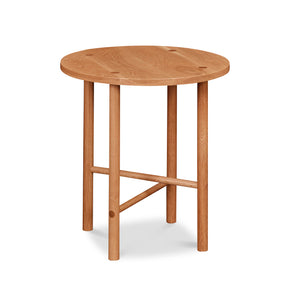 Round Scandinavian style end table with round legs in white oak