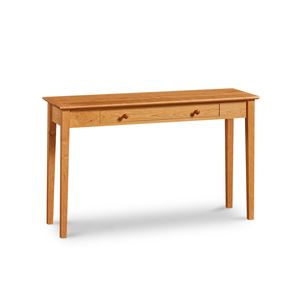 Wide and thin Shaker Sofa Table, built in cherry with one drawer and square tapered legs, from Maine's Chilton Furniture Co. 