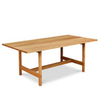 Modern trestle table with visible joinery in white oak, from Maine's Chilton Furniture Co.