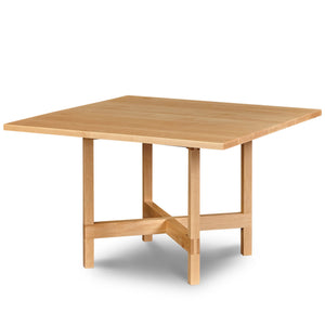 Modern square trestle table with visible joinery in maple, from Maine's Chilton Furniture Co.