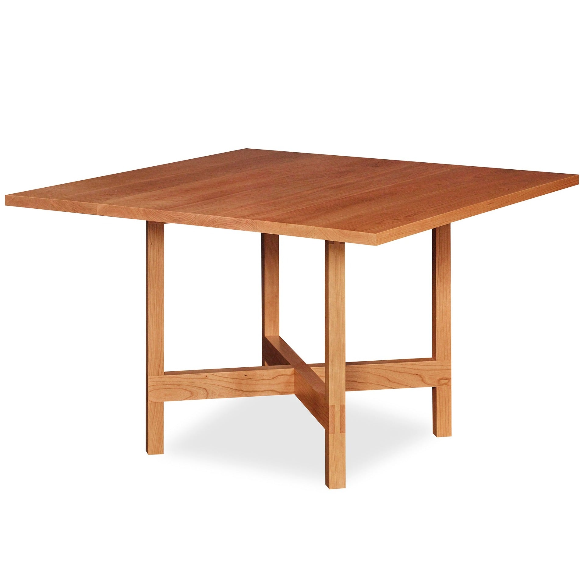 Modern square trestle table with visible joinery in cherry, from Maine's Chilton Furniture Co.