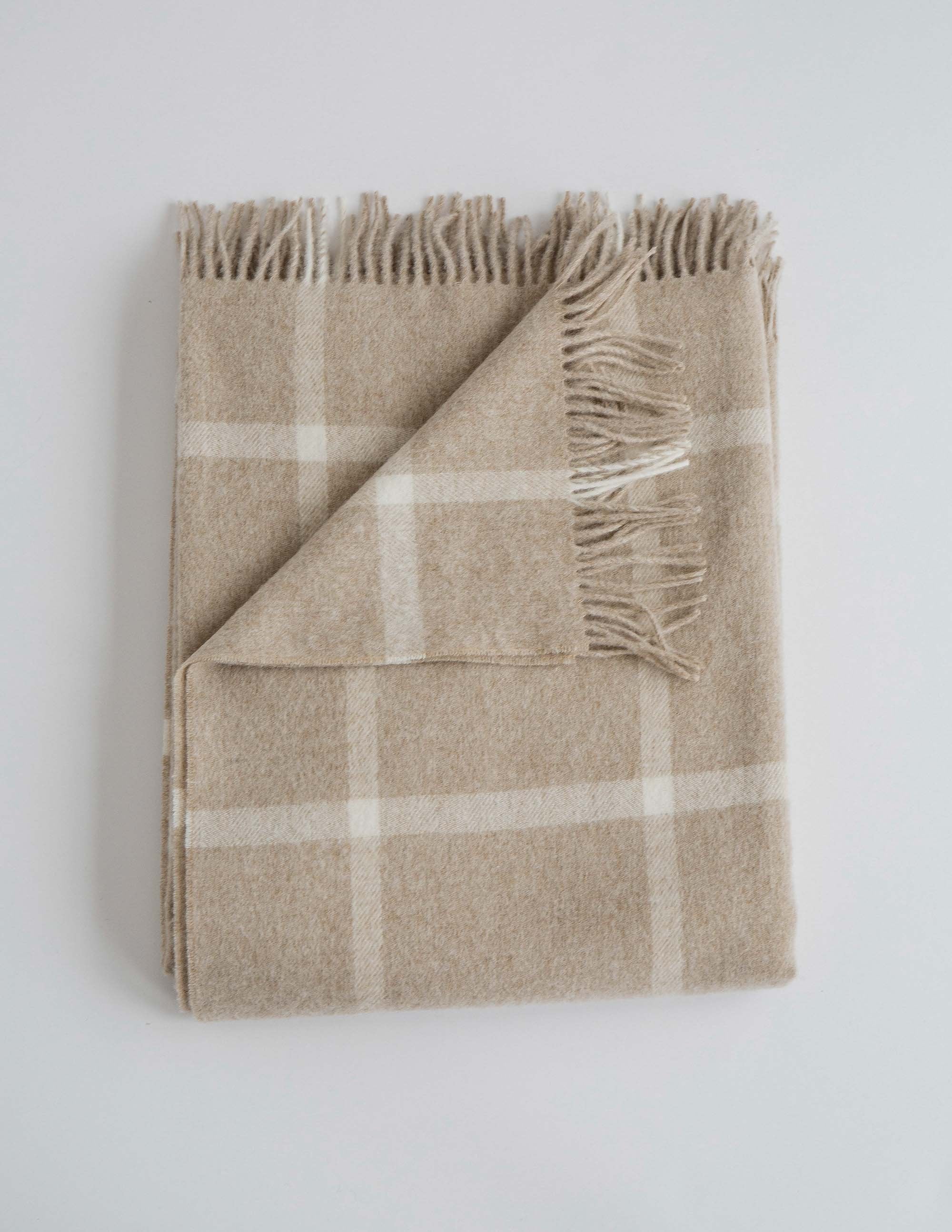 Soft cream checker patterned merino throw blanket