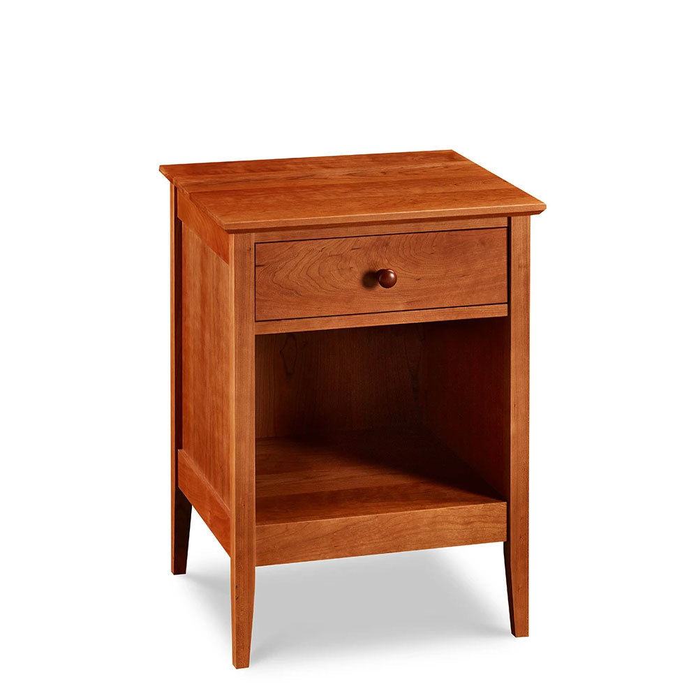 Simple Shaker nightstand with one drawer and tapered legs, in cherry wood, from Maine's Chilton Furniture Co.