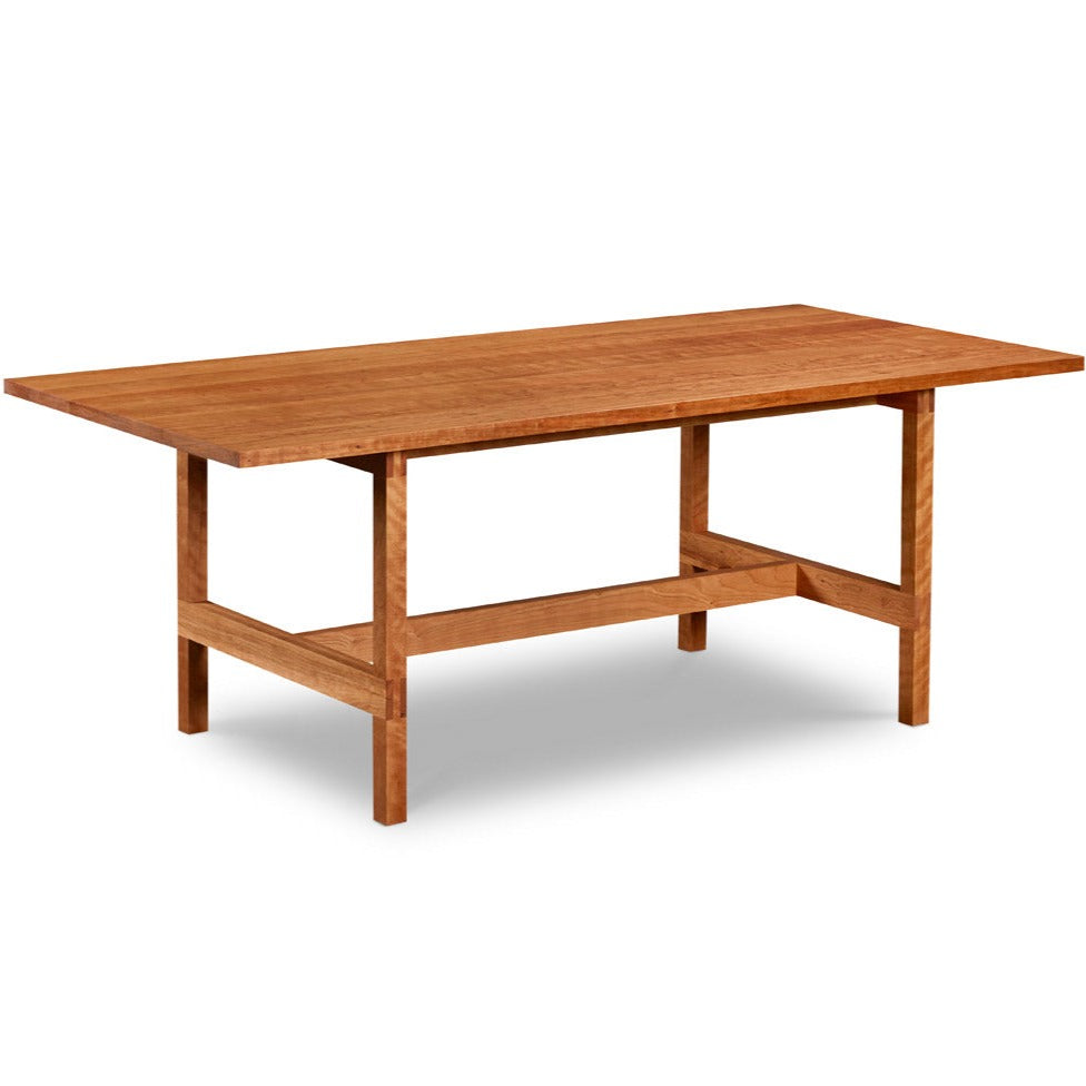 Modern trestle table with visible joinery in cherry, from Maine's Chilton Furniture Co. 